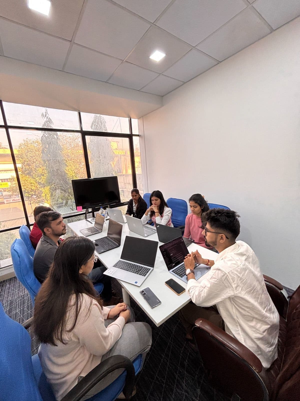 Weekly planning session in the meeting room